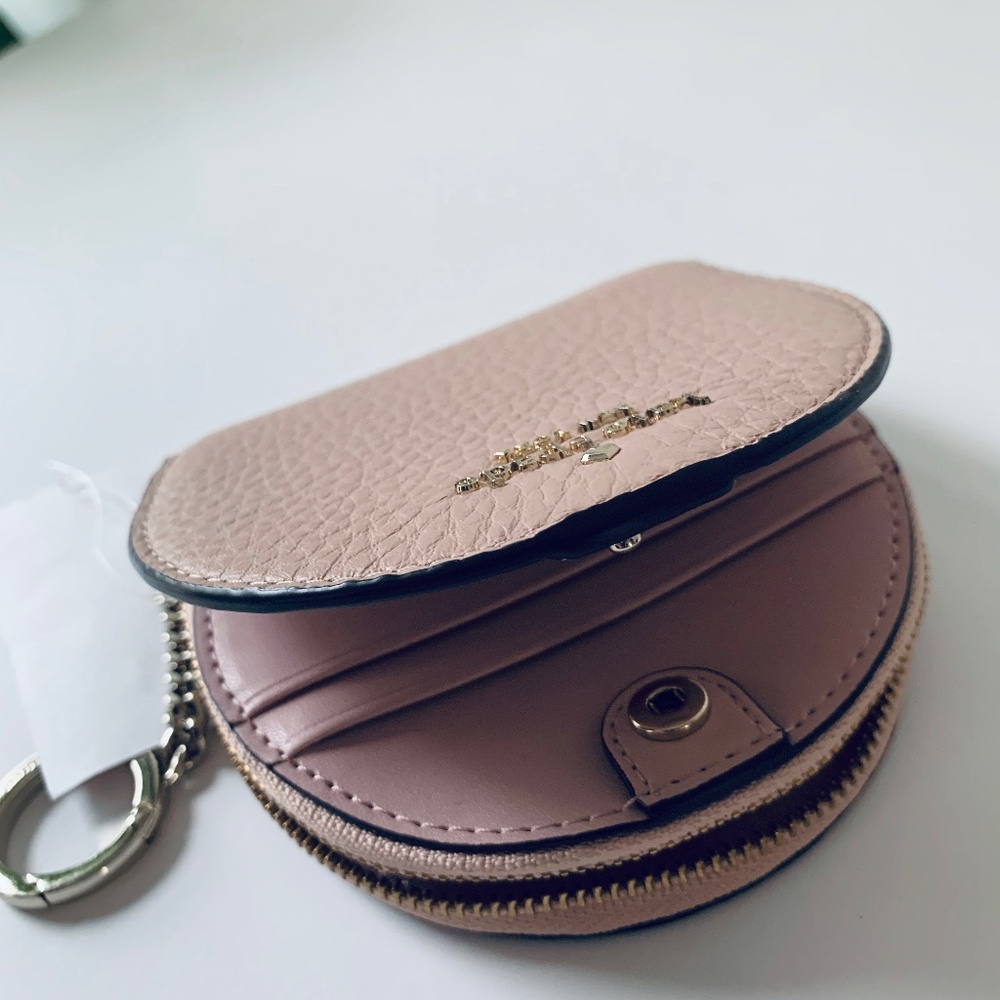 kate spade • Women's half-moon leather wallet